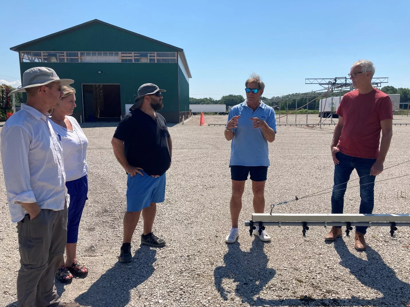 Teammates of LiveRoof working with Pioneer Gardens at a training session in Michigan